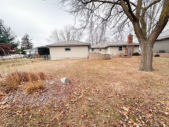 Large back yard with trees that provide privacy. Water feature is a great bonus during the Summer