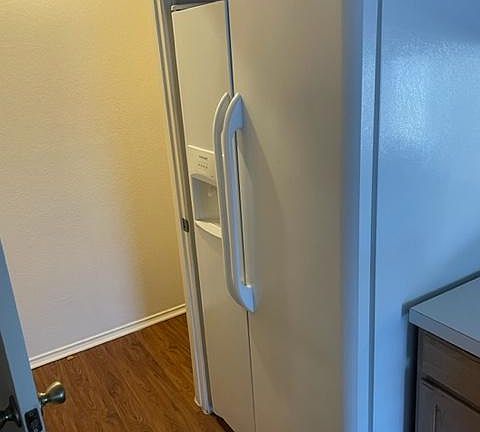 Fridge and door to laundry room