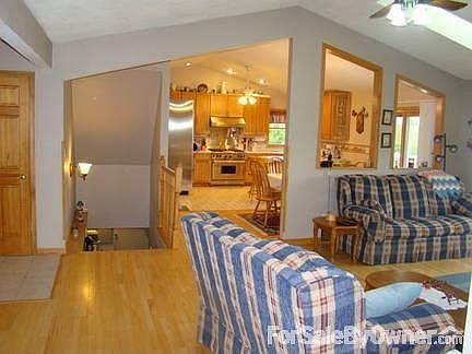 Open floor plan : Vaulted ceilings, hardwood and tile floors and lots of natural light.
