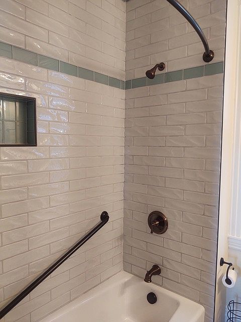 Beautiful tiled to ceiling bathroom