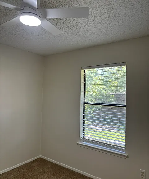 Back left Bedroom (Master) which has direct access into Hall Bathroom.