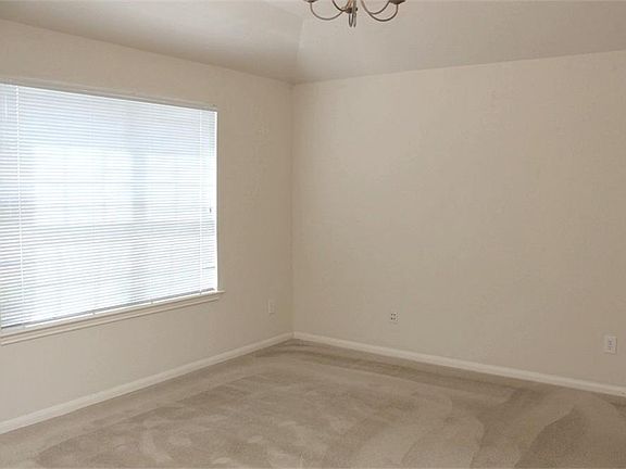 Spacious formal dining room could also be used for a study or formal living room, your choice .