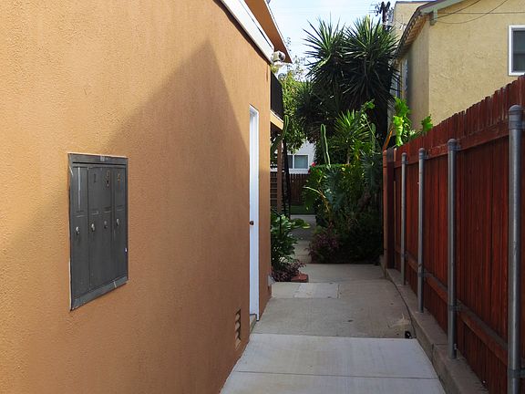 Mailboxes & garage with laundry room