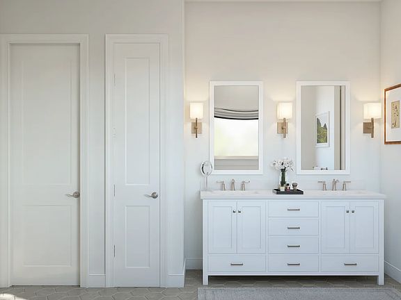 Primary bath featuring freestanding vanity dual sinks