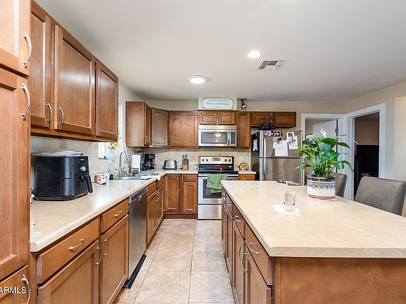 3rd image of 4245 E Desert Cactus St