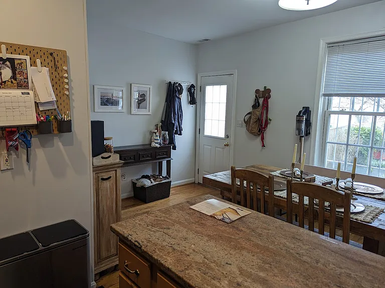 Kitchen/dining area leading to backyard