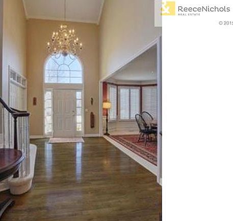Beautiful entry way with soaring ceilings.