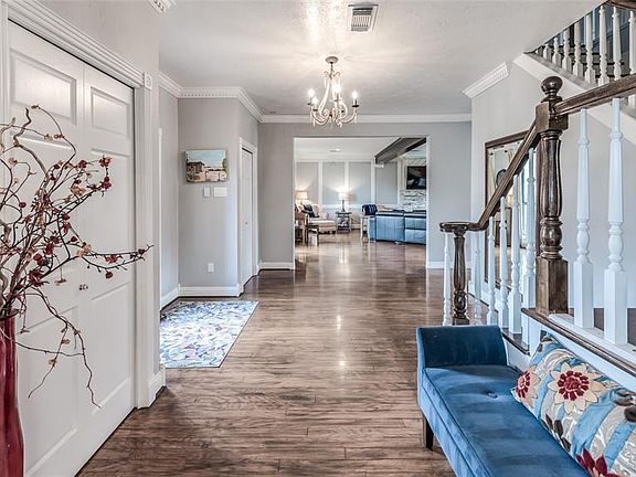 Wrapped in designer paint color, rich hardwood flooring, dental crown Moulding, with accents of farmhouse lighting, this is a wonderful entry to welcome you into this well appointed home.