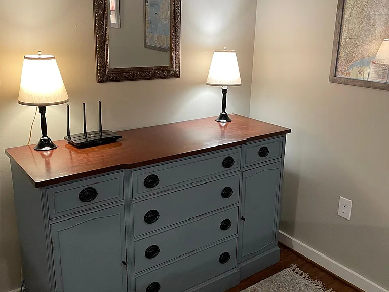 Furnishings includes rugs and lamps.