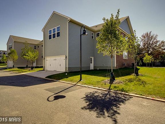 Rear Facade with 2 Car Garage