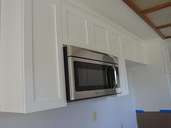 Brand new cabinet and microwave