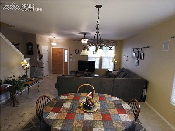Note the 6 panel doors, fabulous lighting fixtures and the front hall closet.