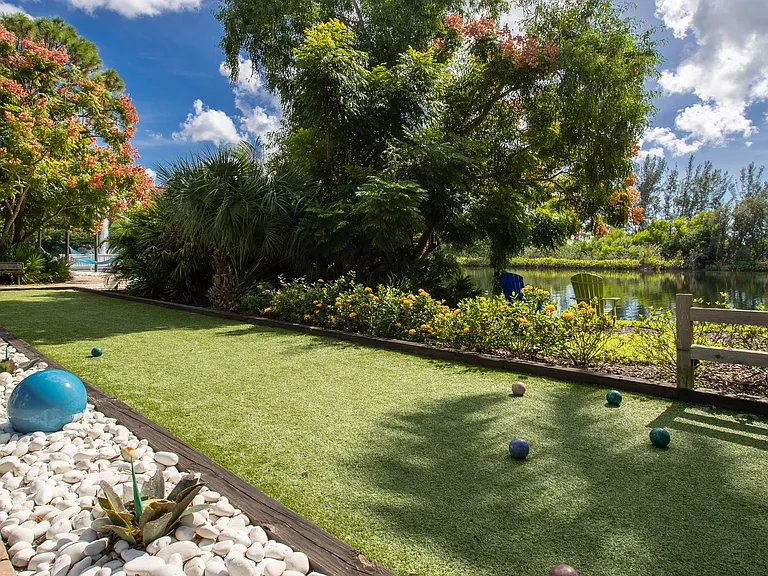 Engage in spirited bocce ball games by the lake.