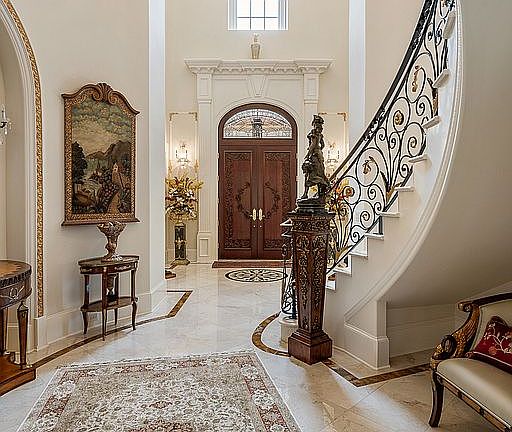 Two story grand formal entry