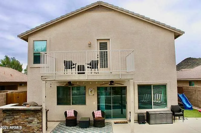 Back of the house. You can see part of the play area on the side of the house.