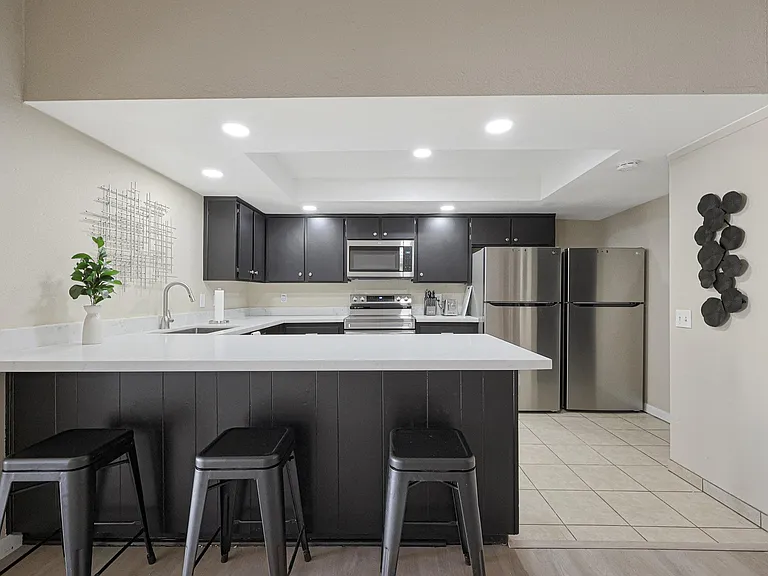 Kitchen with 2 refrigerators