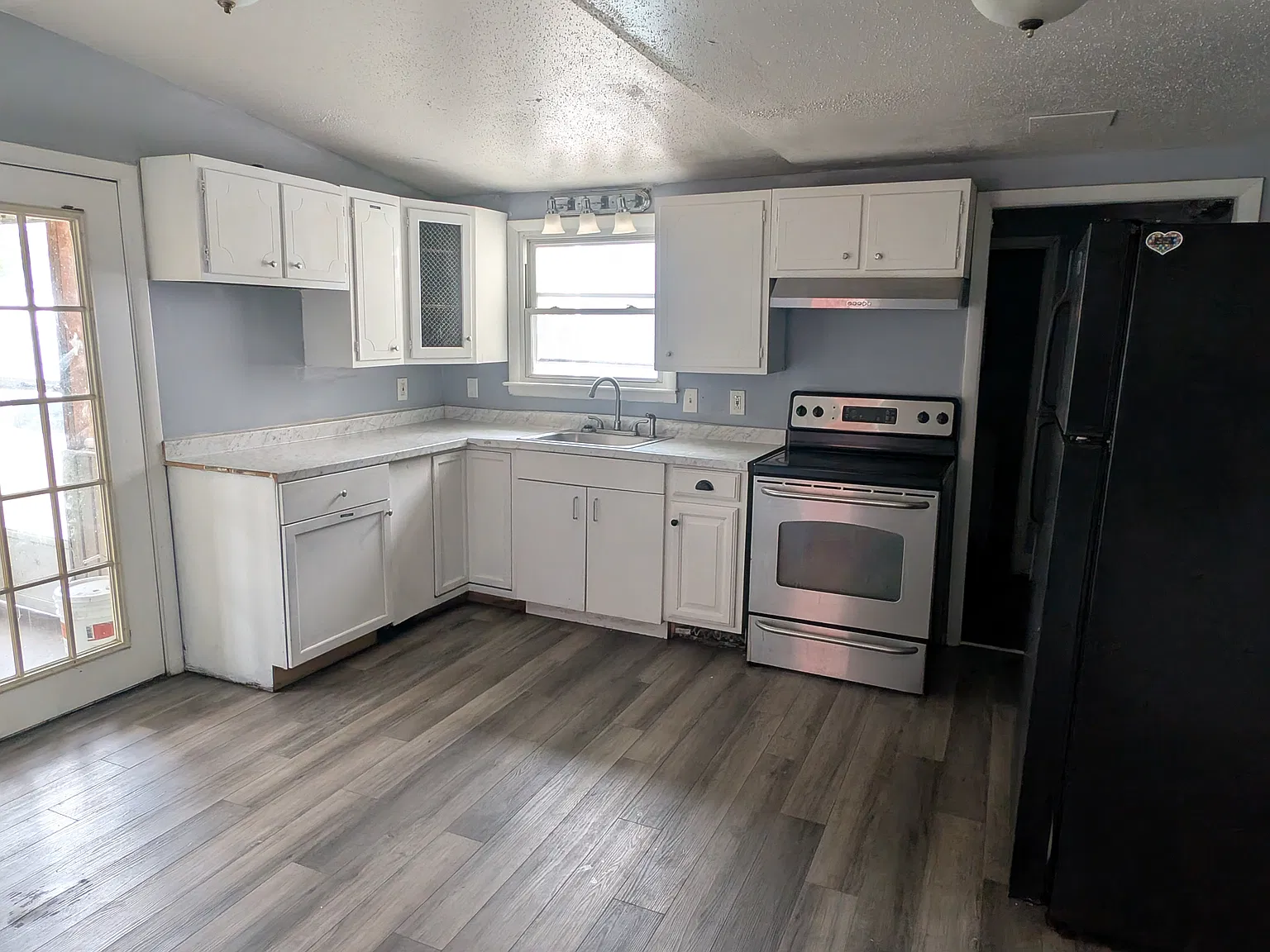 4 bed, 1.5 bath, 1180 sqft, $1,650 — Photo 1