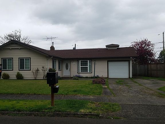 extra wide driveway and attached garage