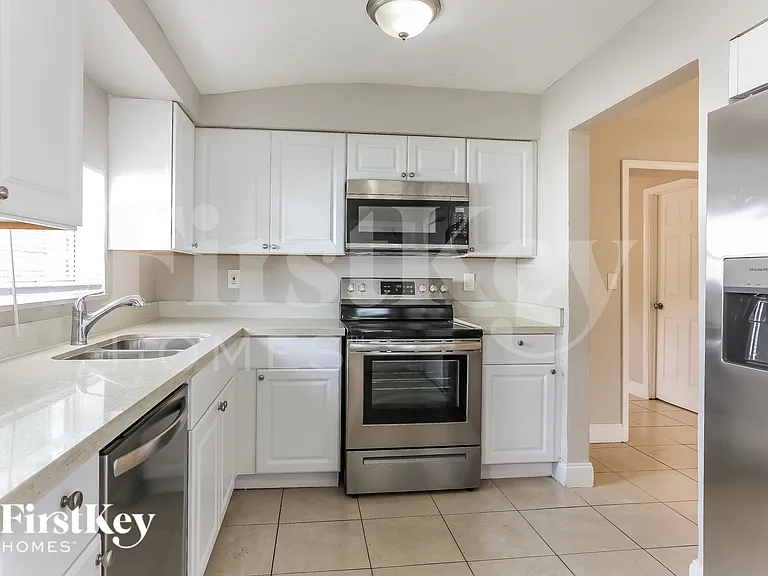 3751 NW 9th Ct — Photo 6