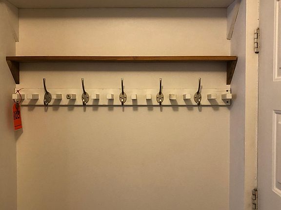 Foyer hook rack and shelves.