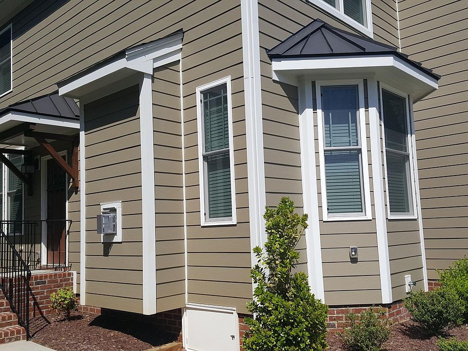 Enjoy maintenance free landscaping in this elegant townhome