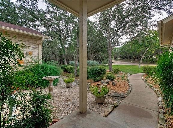 Thoughtful landscaping creates an easy-to-care for and elegant atmosphere in the yard.