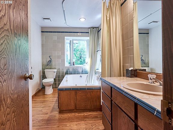 Second bathroom with jacuzzi tub and shower