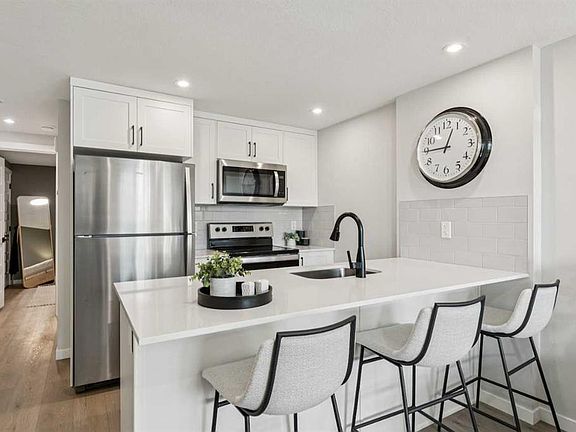 2nd image of 155 S Crimson Ridge Pl NW #105
