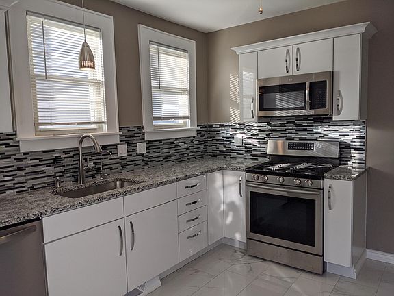 GCFI outlets, Gas Stove, microwave with outside venting, and lazy susan.