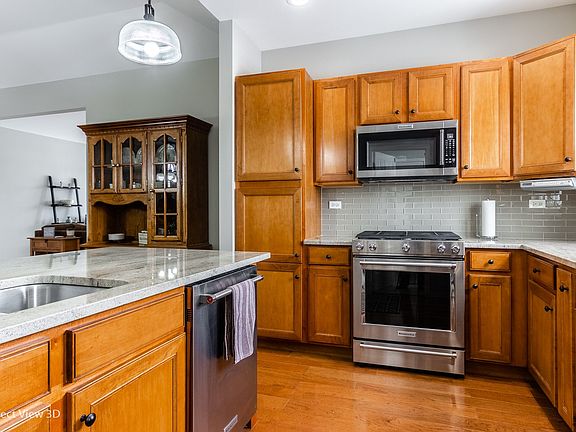 upgraded KitchenAid appliances(2017) and cabinets with pull out shelves.