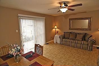 Living Room with Walk Out to Rear Patio and Deck