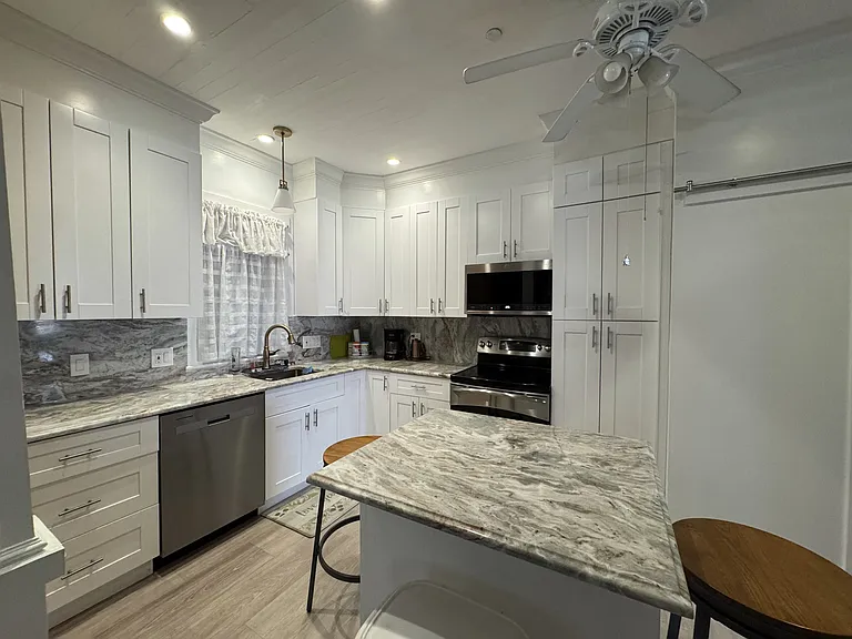 Nicely upgraded counters, cabinets and appliances.