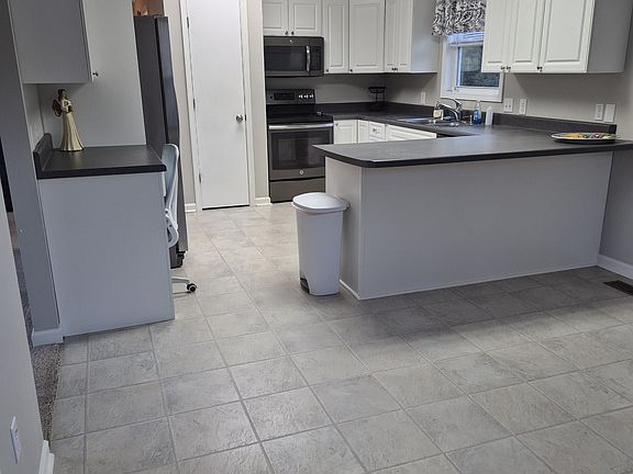 Kitchen with large eating area