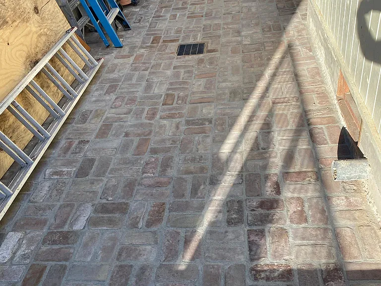 200 SQUARE FEET PLUS PRIVATE PATIO TO COME WITH UNIT RENTAL (NOTE - BUILDING MATERIALS TO LEFT WILL BE REMOVED PRIOR TO OCCUPANCY)