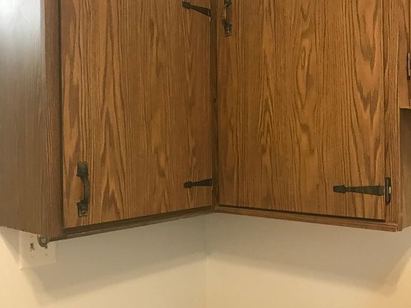 some of the cabinets in laundry