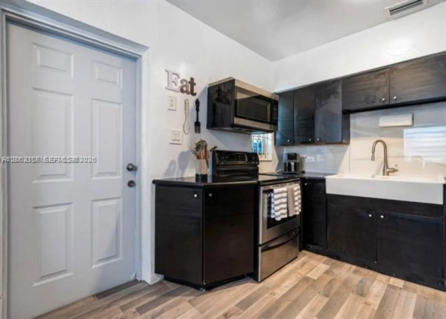 1021 NW 37th Ave # 1021, Miami, FL 33125 — Photo 1