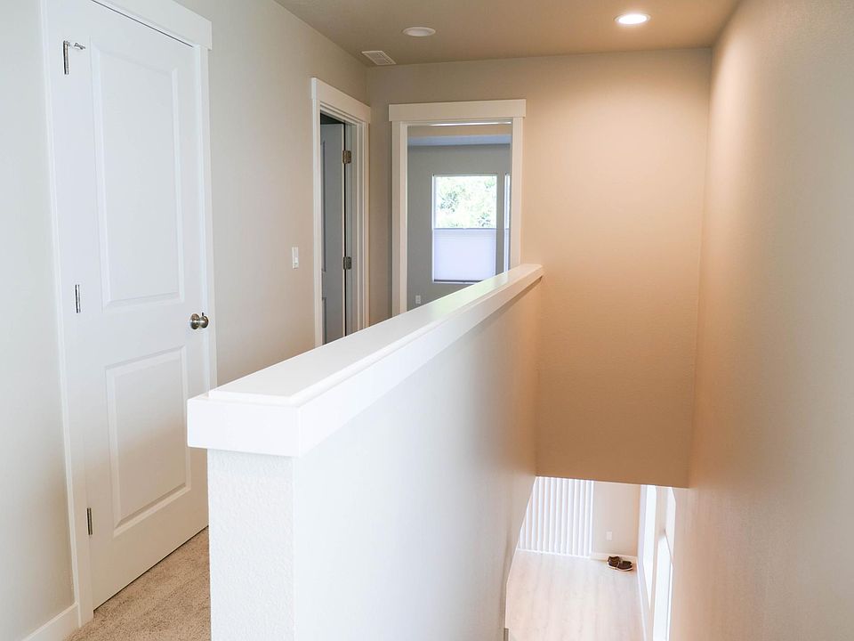 Second floor with the view toward large bathroom and 1st floor