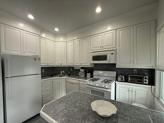 View of kitchen from living room