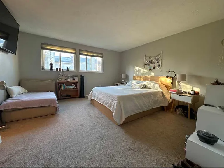 Large main bedroom with large new windows. Walk in closet and it's own bathroom