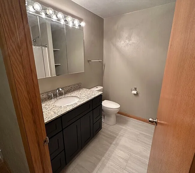 Remodeled Main Bathroom with large 46" Vanity with granite countertop