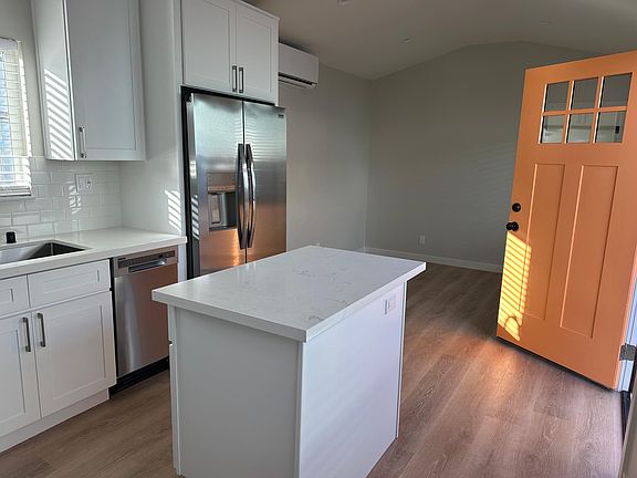 New Shaker cabinets, new appliances, quartz counters.