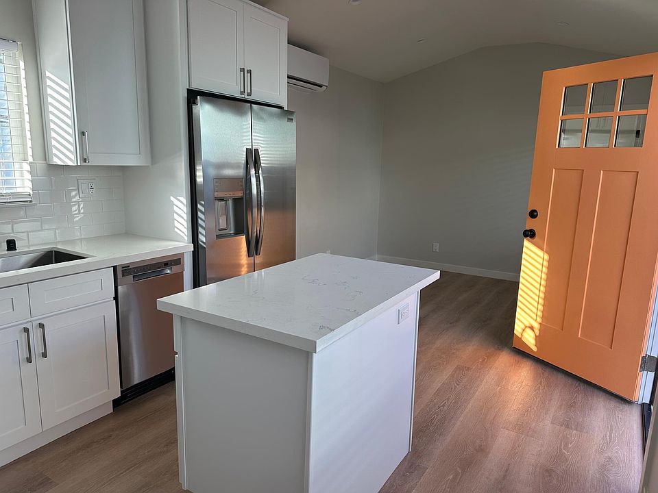 New Shaker cabinets, new appliances, quartz counters.