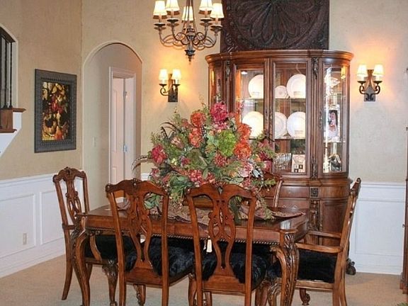 Formal dining room just inside entry hall