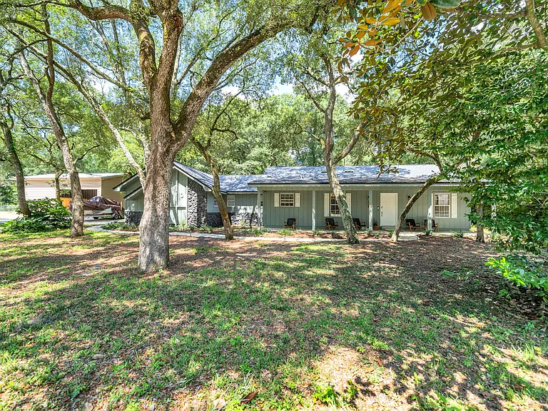 910 Whisperwood Ln S — Photo 45