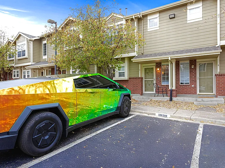 Spacious townhouse with ample parking and a tranquil outdoor patio. Perfect for a relaxing getaway.