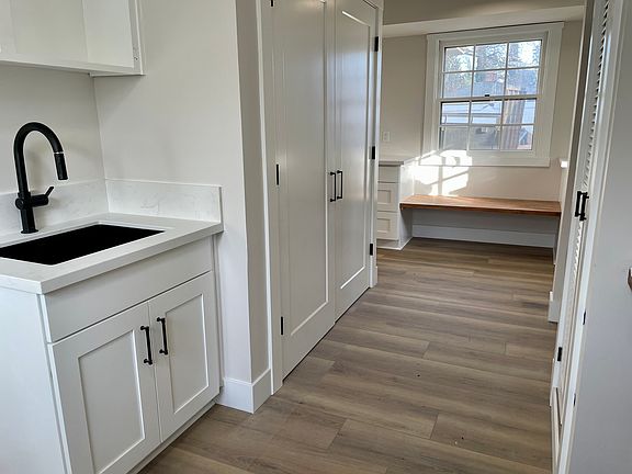 Mud Room/Laundry Room with lots of storage and utility sink