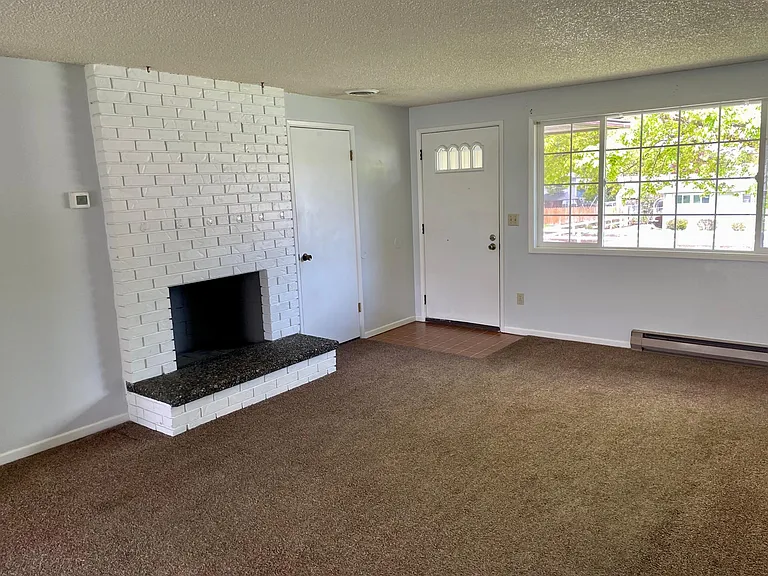 Forced air and central AC on top floor. Supplemental baseboard heaters.