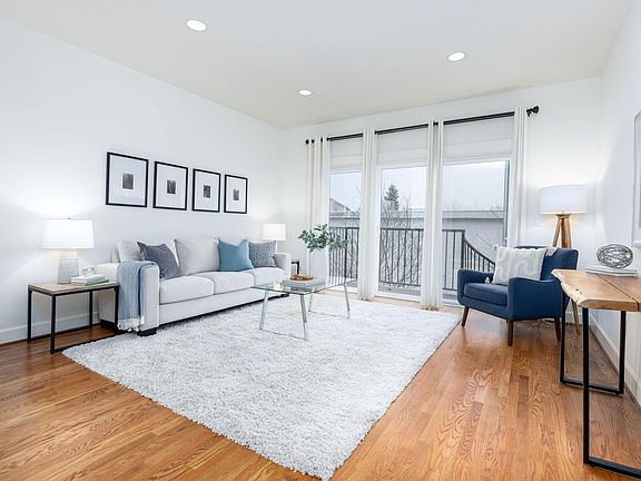 Once you enter the home and get to the top of the stairs, you're greeted with a view of the living room