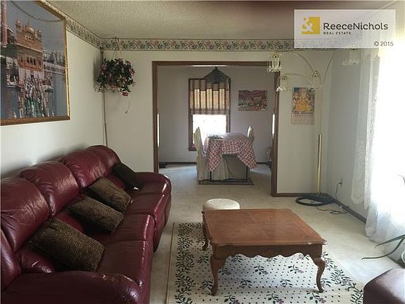 FORMAL LIVING ROOM LOOKING INTO DINING ROOM