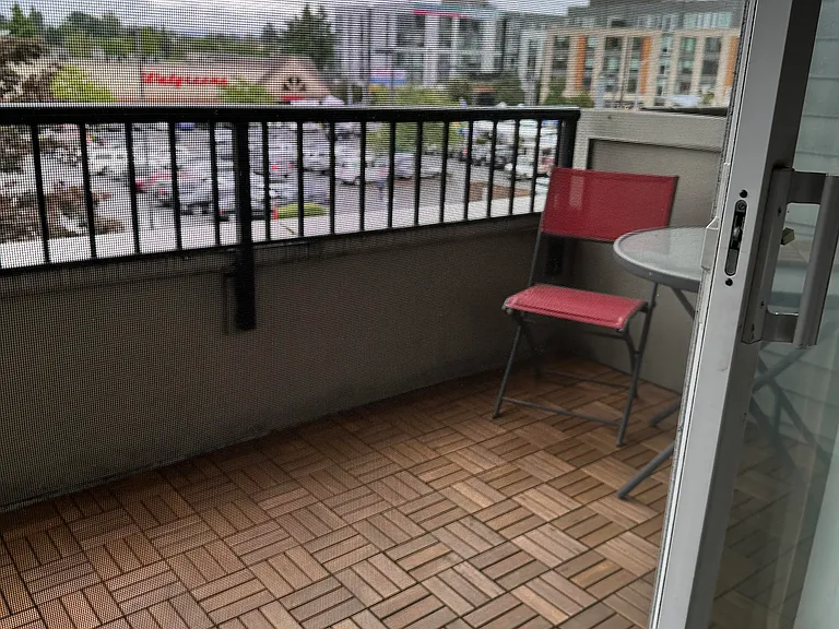 New wood tiles on balcony; create an outdoor living space!